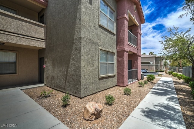 8000 Badura Ave Unit 1168, Las Vegas, NV 89113 - view of side of home with stucco siding
