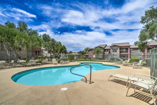 8000 Badura Ave Unit 1168, Las Vegas, NV 89113 - community pool featuring a patio area and a residential view