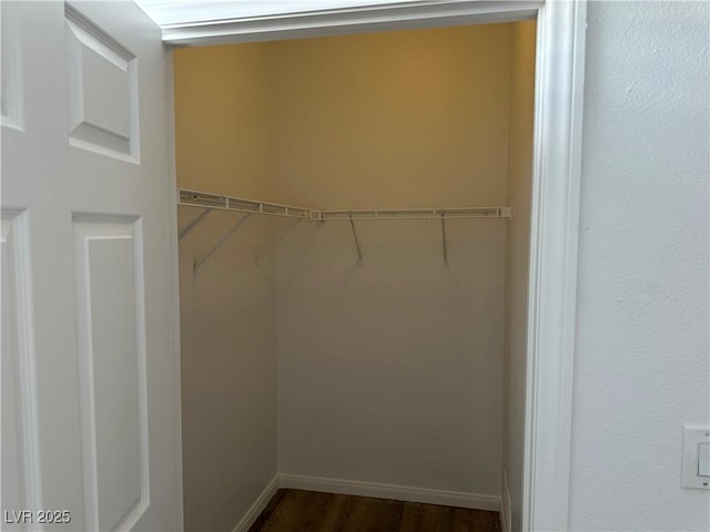 8000 Badura Ave Unit 1168, Las Vegas, NV 89113 - spacious closet featuring dark wood-style flooring