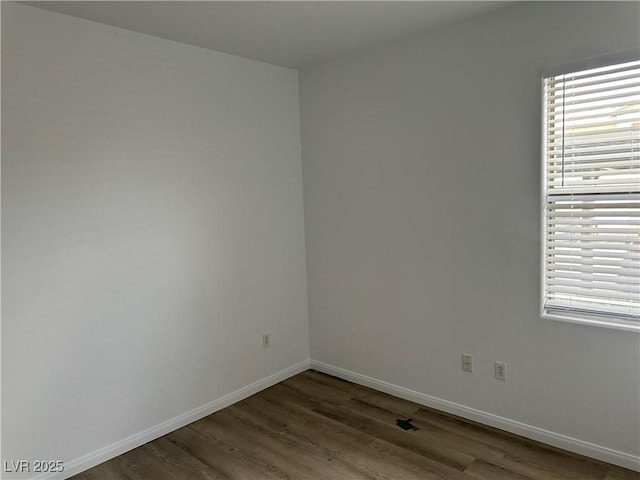 8000 Badura Ave Unit 1168, Las Vegas, NV 89113 - empty room featuring wood finished floors and healthy amount of natural light