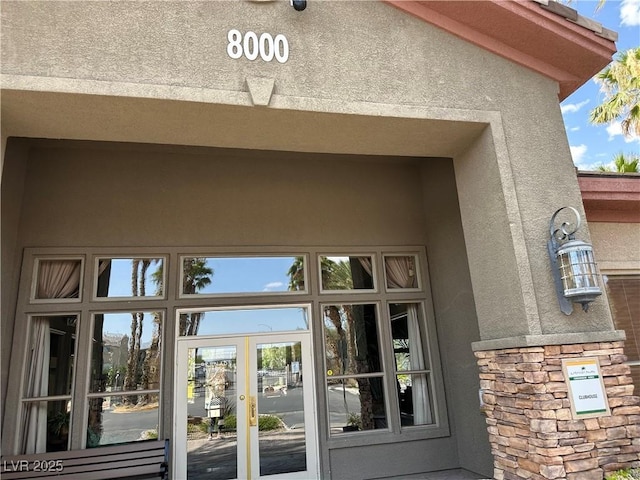 8000 Badura Ave Unit 1168, Las Vegas, NV 89113 - entrance to property with stucco siding and stone siding