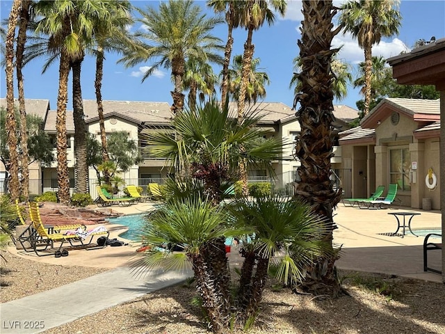 8000 Badura Ave Unit 1168, Las Vegas, NV 89113 - community pool featuring a patio area