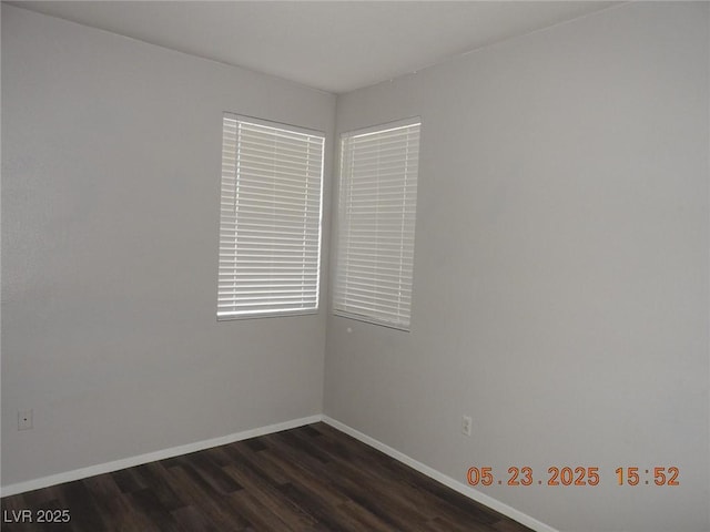 75 N Valle Verde Dr Unit 411, Henderson, NV 89074 - empty room featuring baseboards and dark wood-type flooring