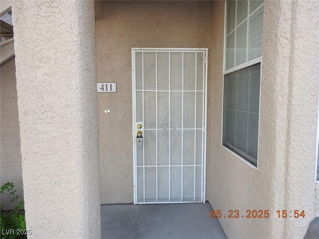 75 N Valle Verde Dr Unit 411, Henderson, NV 89074 - entrance to property with stucco siding