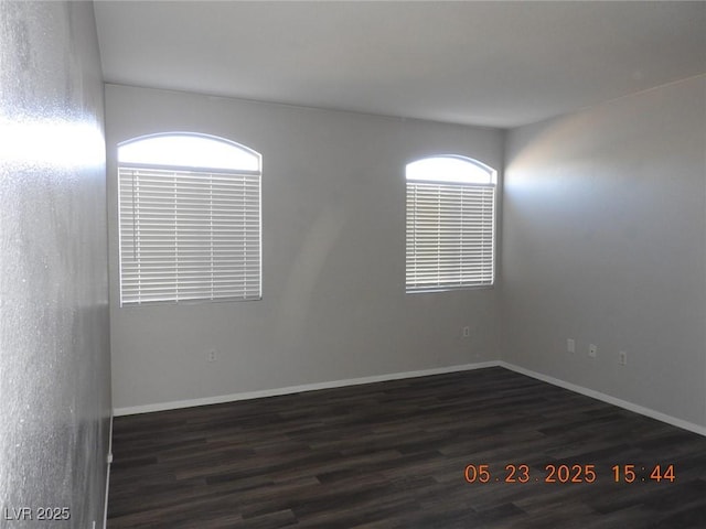 75 N Valle Verde Dr Unit 411, Henderson, NV 89074 - empty room featuring dark wood-style floors and baseboards