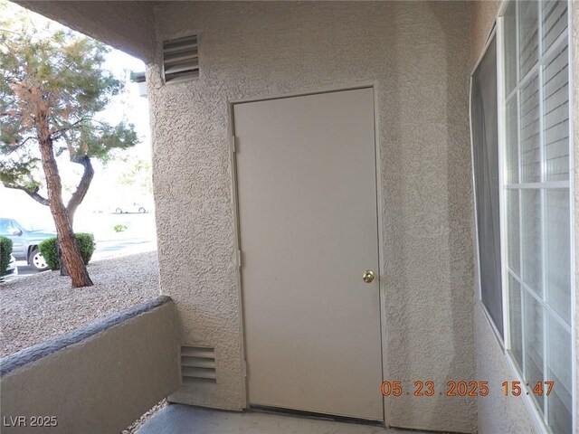 75 N Valle Verde Dr Unit 411, Henderson, NV 89074 - property entrance featuring stucco siding and a balcony