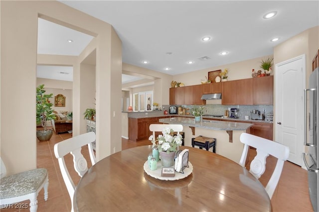 9375 Gold Lake Ave, Las Vegas, NV 89149 - dining room with light tile patterned floors and recessed lighting