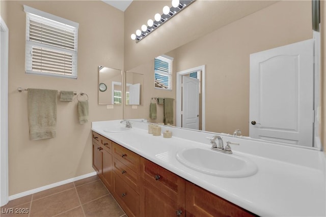 9375 Gold Lake Ave, Las Vegas, NV 89149 - bathroom with double vanity, tile patterned floors, and baseboards