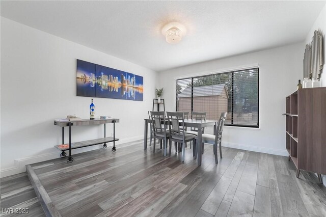 7009 Rawlins Ct, Las Vegas, NV 89128 - dining room with wood finished floors and baseboards