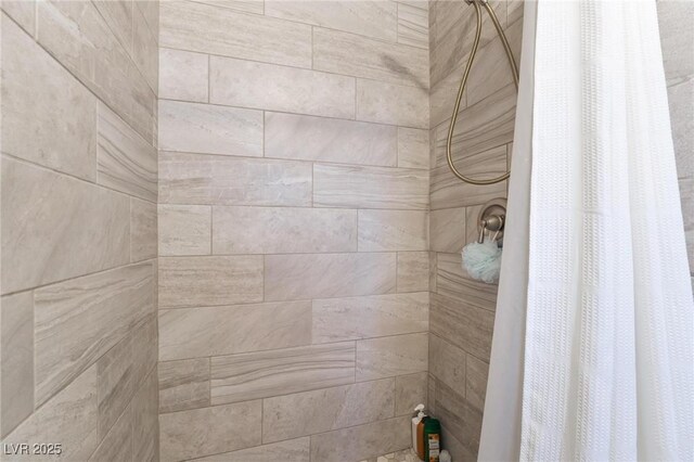 7009 Rawlins Ct, Las Vegas, NV 89128 - bathroom featuring a tile shower