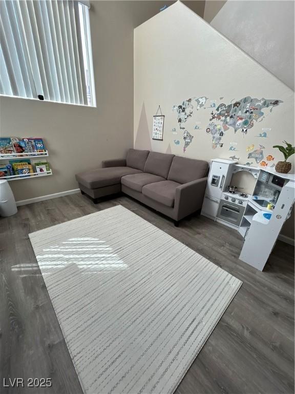 6812 Dipper Ave, North Las Vegas, NV 89084 - living area with wood finished floors and baseboards