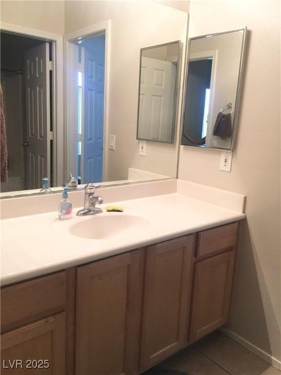 6812 Dipper Ave, North Las Vegas, NV 89084 - bathroom with vanity and tile patterned floors