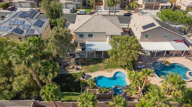 8121 Eagle Clan Ct, Las Vegas, NV 89131 - aerial view of residential area with a pool area
