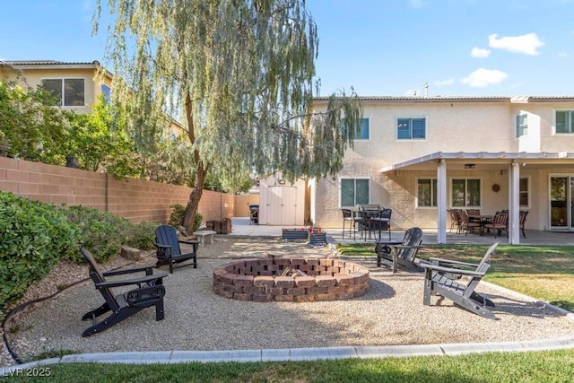 8121 Eagle Clan Ct, Las Vegas, NV 89131 - view of patio featuring a fire pit