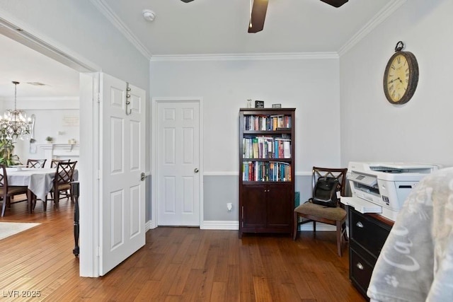 8121 Eagle Clan Ct, Las Vegas, NV 89131 - sitting room featuring ornamental molding, ceiling fan, dark wood-type flooring, a chandelier, and baseboards
