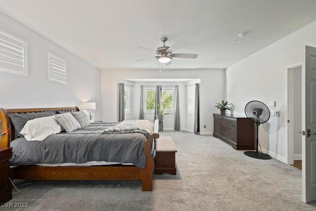 8121 Eagle Clan Ct, Las Vegas, NV 89131 - bedroom with carpet, a ceiling fan, and baseboards