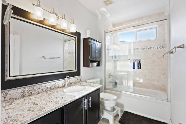 8121 Eagle Clan Ct, Las Vegas, NV 89131 - full bath with toilet, vanity, and shower / bath combination with glass door
