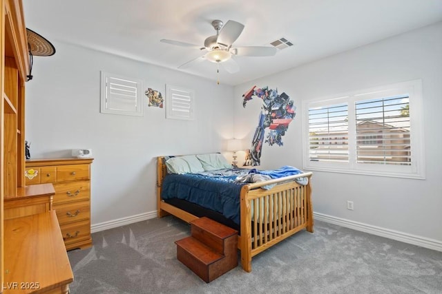 8121 Eagle Clan Ct, Las Vegas, NV 89131 - carpeted bedroom with baseboards and a ceiling fan