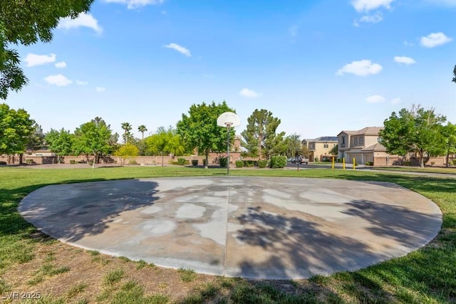 8121 Eagle Clan Ct, Las Vegas, NV 89131 - view of basketball court featuring community basketball court, a lawn, and a residential view