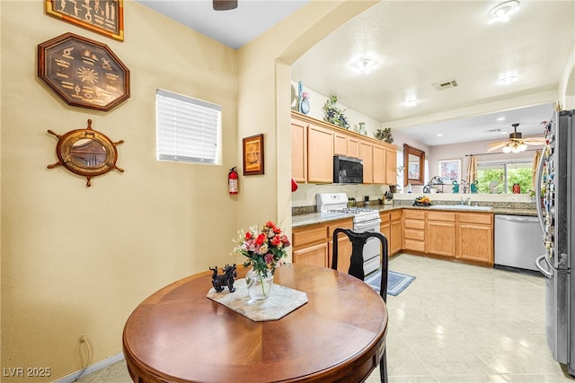 7724 Somerhill Point Way, Las Vegas, NV 89139 - dining space featuring ceiling fan and baseboards
