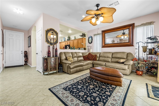 7724 Somerhill Point Way, Las Vegas, NV 89139 - living room with a ceiling fan and light tile patterned floors
