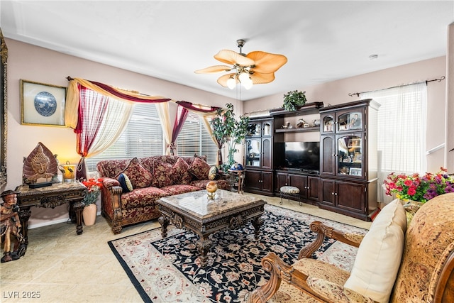 7724 Somerhill Point Way, Las Vegas, NV 89139 - living room featuring ceiling fan and light tile patterned floors