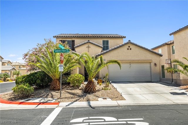 7724 Somerhill Point Way, Las Vegas, NV 89139 - mediterranean / spanish home featuring an attached garage, concrete driveway, stucco siding, and a tiled roof
