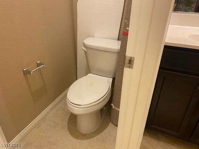 152 Lotus Vale Ave, Las Vegas, NV 89123 - bathroom featuring toilet, vanity, and tile patterned flooring
