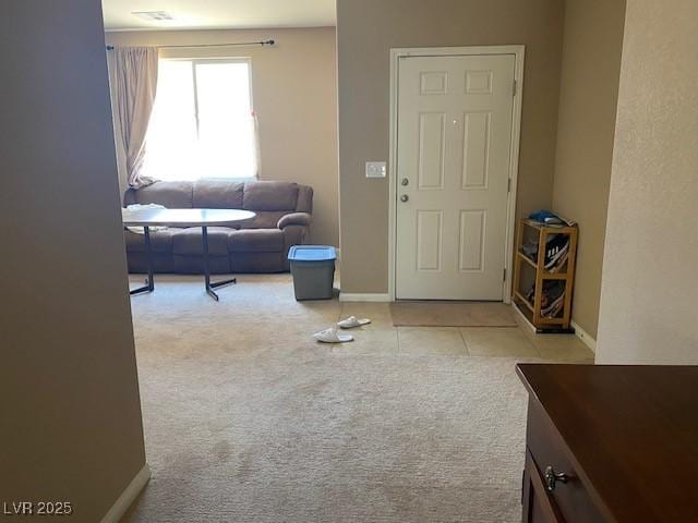 152 Lotus Vale Ave, Las Vegas, NV 89123 - carpeted foyer entrance featuring baseboards and tile patterned flooring
