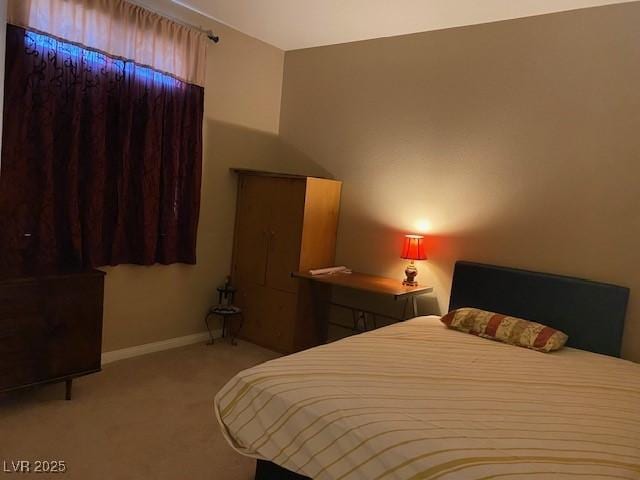 152 Lotus Vale Ave, Las Vegas, NV 89123 - bedroom with light colored carpet and baseboards
