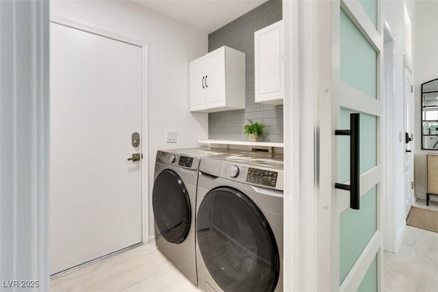 2429 Worchester Rd, Henderson, NV 89074 - laundry area featuring washing machine and dryer and cabinet space