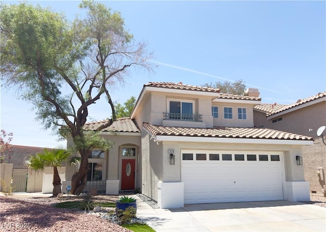 2429 Worchester Rd, Henderson, NV 89074 - mediterranean / spanish-style home featuring a balcony, concrete driveway, and stucco siding