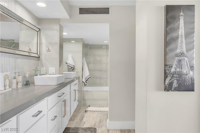 3111 Bel Air Dr Unit 22B, Las Vegas, NV 89109 - full bath with vanity, bathing tub / shower combination, and recessed lighting
