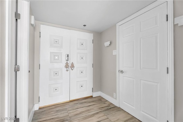 3111 Bel Air Dr Unit 22B, Las Vegas, NV 89109 - entryway with baseboards and light wood finished floors