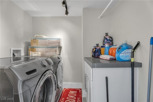 3111 Bel Air Dr Unit 22B, Las Vegas, NV 89109 - laundry room featuring separate washer and dryer and cabinet space