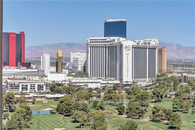 3111 Bel Air Dr Unit 22B, Las Vegas, NV 89109 - city view with a golf course and a water and mountain view
