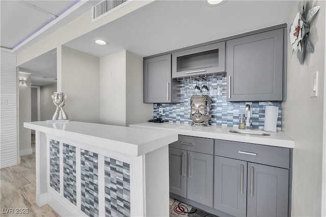 3111 Bel Air Dr Unit 22B, Las Vegas, NV 89109 - indoor bar with decorative backsplash and recessed lighting