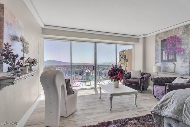 3111 Bel Air Dr Unit 22B, Las Vegas, NV 89109 - living area with healthy amount of natural light and wood finished floors