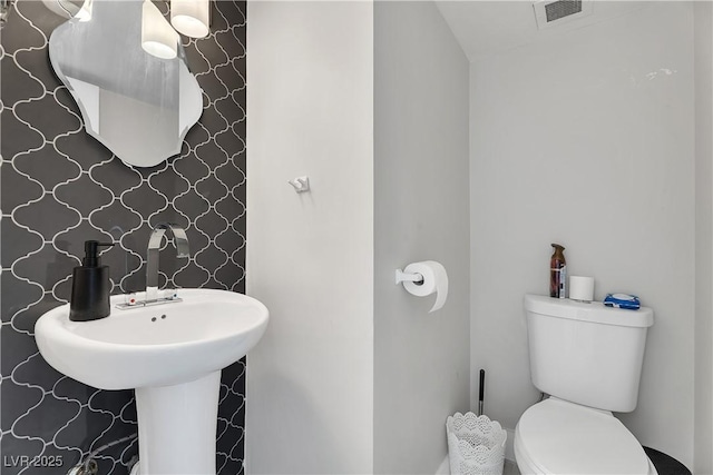 3111 Bel Air Dr Unit 22B, Las Vegas, NV 89109 - half bath featuring toilet