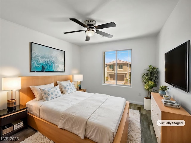 5709 Jaysin Douglas St, North Las Vegas, NV 89031 - bedroom with wood finished floors, baseboards, and a ceiling fan