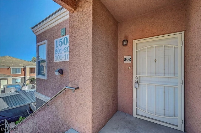 1505 Blackcombe St Unit 202, Las Vegas, NV 89128 - property entrance featuring stucco siding
