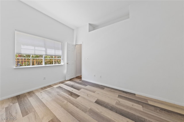 5232 Saranac Rd, Las Vegas, NV 89130 - spare room with wood finished floors and baseboards