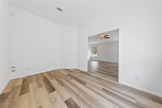 5232 Saranac Rd, Las Vegas, NV 89130 - spare room with wood finished floors, baseboards, and ceiling fan