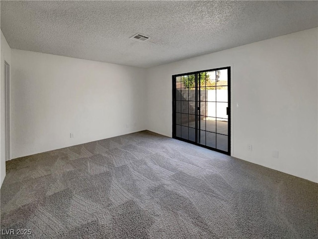 1832 Yellow Rose St, Las Vegas, NV 89108 - unfurnished room with carpet floors and a textured ceiling