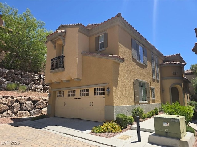 11298 Corsica Mist Ave, Las Vegas, NV 89135 - view of building exterior with a garage and driveway