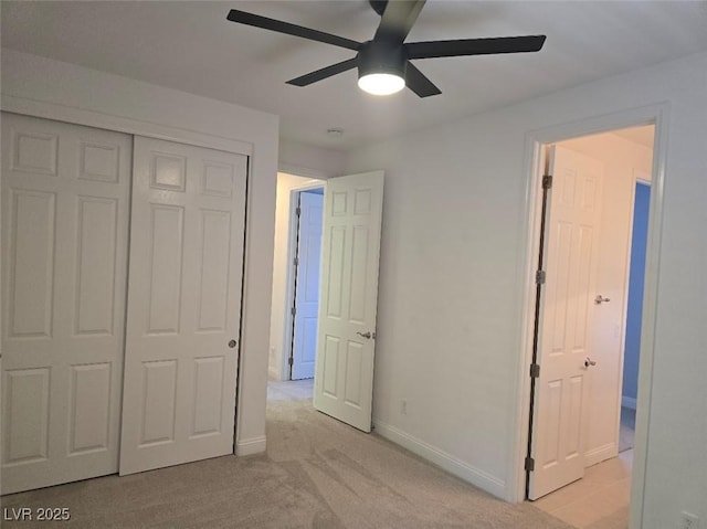 11298 Corsica Mist Ave, Las Vegas, NV 89135 - unfurnished bedroom with a closet, light carpet, and a ceiling fan