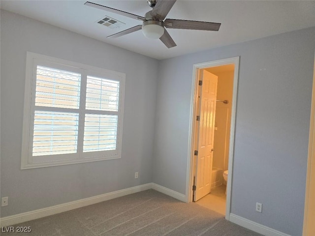 11298 Corsica Mist Ave, Las Vegas, NV 89135 - spare room featuring a ceiling fan, healthy amount of natural light, and carpet flooring