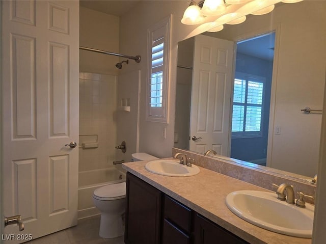 11298 Corsica Mist Ave, Las Vegas, NV 89135 - bathroom featuring double vanity, bathing tub / shower combination, tile patterned flooring, and a chandelier