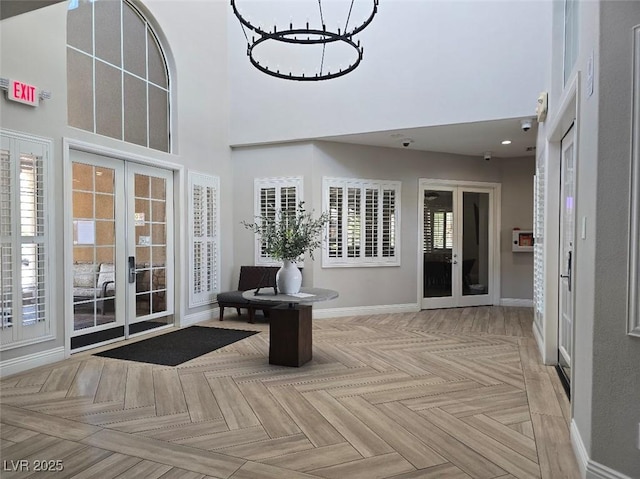 11298 Corsica Mist Ave, Las Vegas, NV 89135 - building lobby with a towering ceiling and a security system
