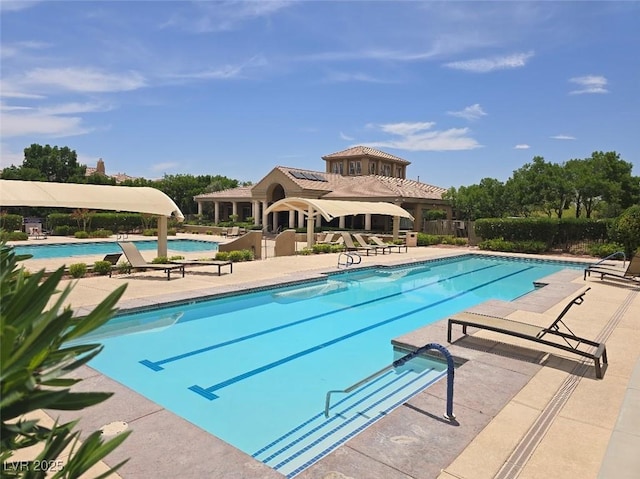 11298 Corsica Mist Ave, Las Vegas, NV 89135 - community pool featuring a patio area
